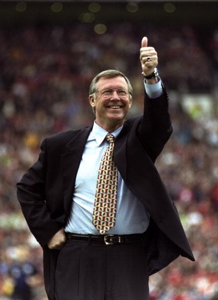 Alex Ferguson the manager of Manchester United celebrates winning the title during the FA Carling Premiership 1999