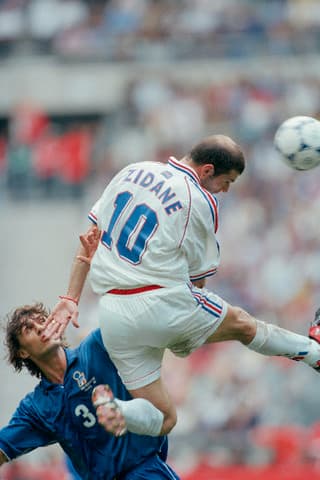 French player Zinedine Zidane and Paolo Maldini, during the 1998 soccer World Cup quarter-final match against Italy.