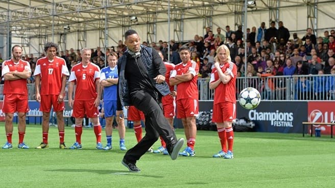 Hollywood star Will Smith takes a penalty before the Ultimate Champions Match at the UEFA Champions Festival in Stratford