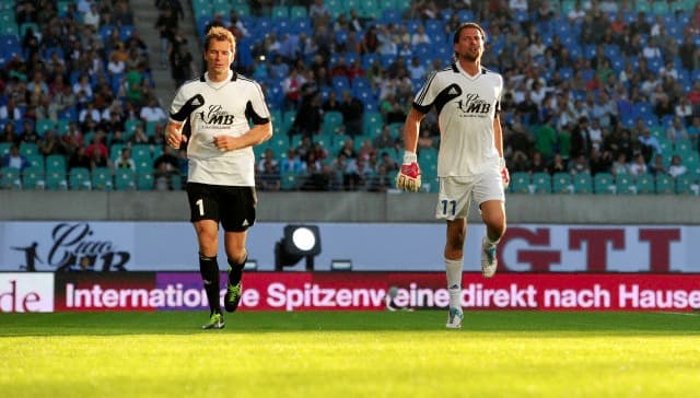 Roman Weidenfeller (r) with Jens Lehmann is pictured during Michael Ballack's farewell match at Red Bull Arena in Leipzig, Germany, 05 June 2013