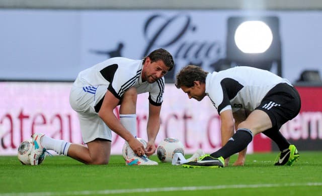 Roman Weidenfeller (r) with Jens Lehmann is pictured during Michael Ballack's farewell match at Red Bull Arena in Leipzig, Germany, 05 June 2013