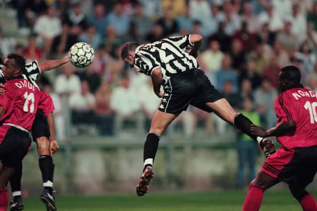 Zinedine Zidane heads the ball during an Intertoto match between Juventus and Rennes. 1999