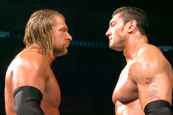 باتیستا - تریپل-اچ - رسلمنیا-۲۱ - قهرمانی-سنگینوزن - WWE - نبرد-تاریخی - Evolution - مسابقه-خاطرهانگیز