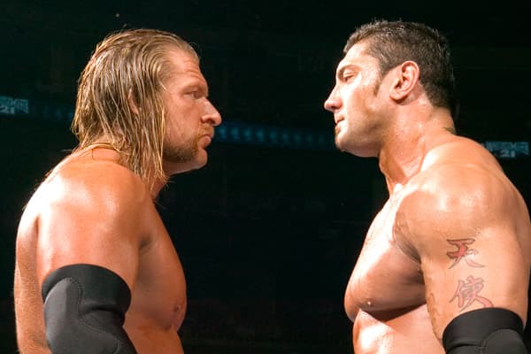باتیستا - تریپل-اچ - رسلمنیا-۲۱ - قهرمانی-سنگینوزن - WWE - نبرد-تاریخی - Evolution - مسابقه-خاطرهانگیز