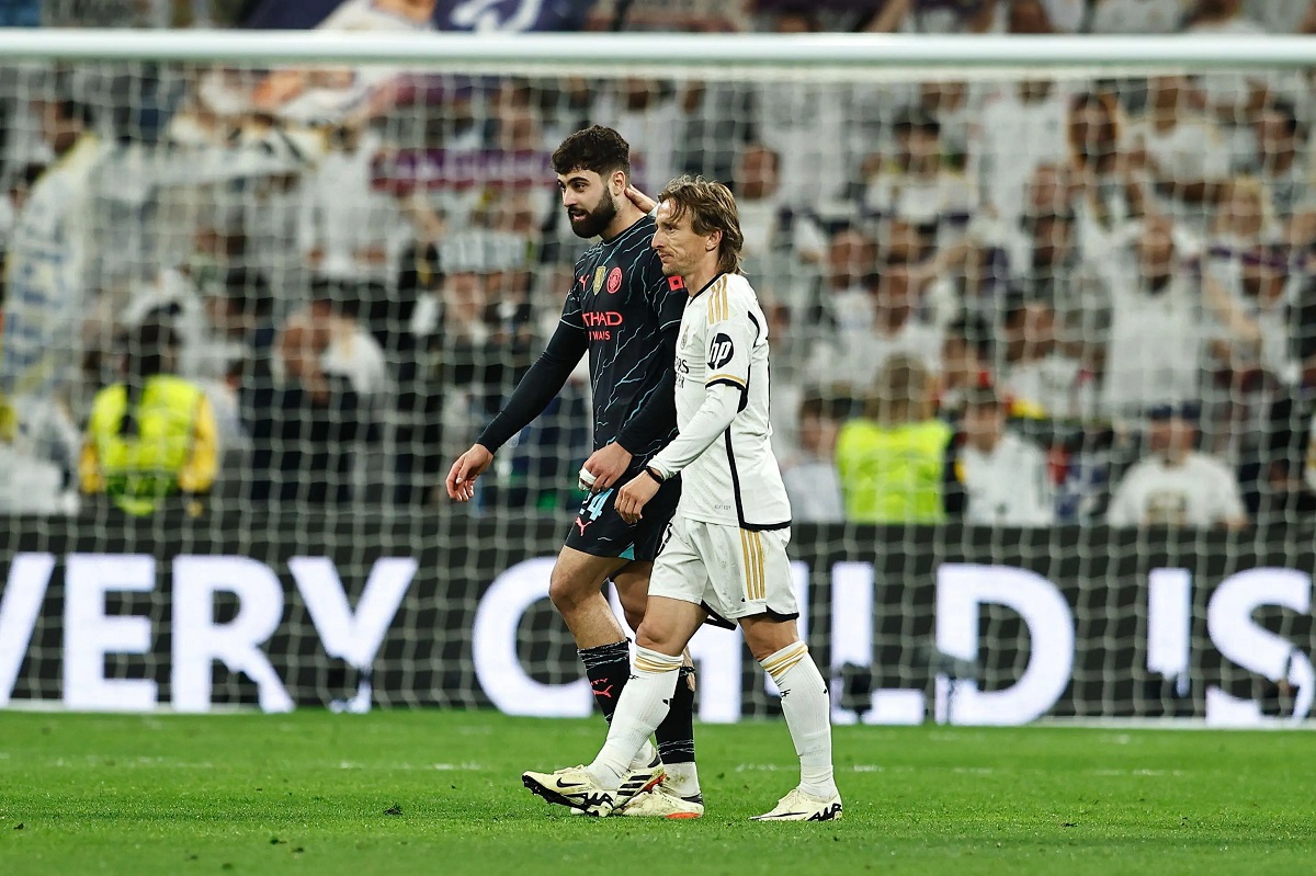 یوشکو گواردیول و لوکا مودریچ در بازی رئال مادرید و منچسترسیتی