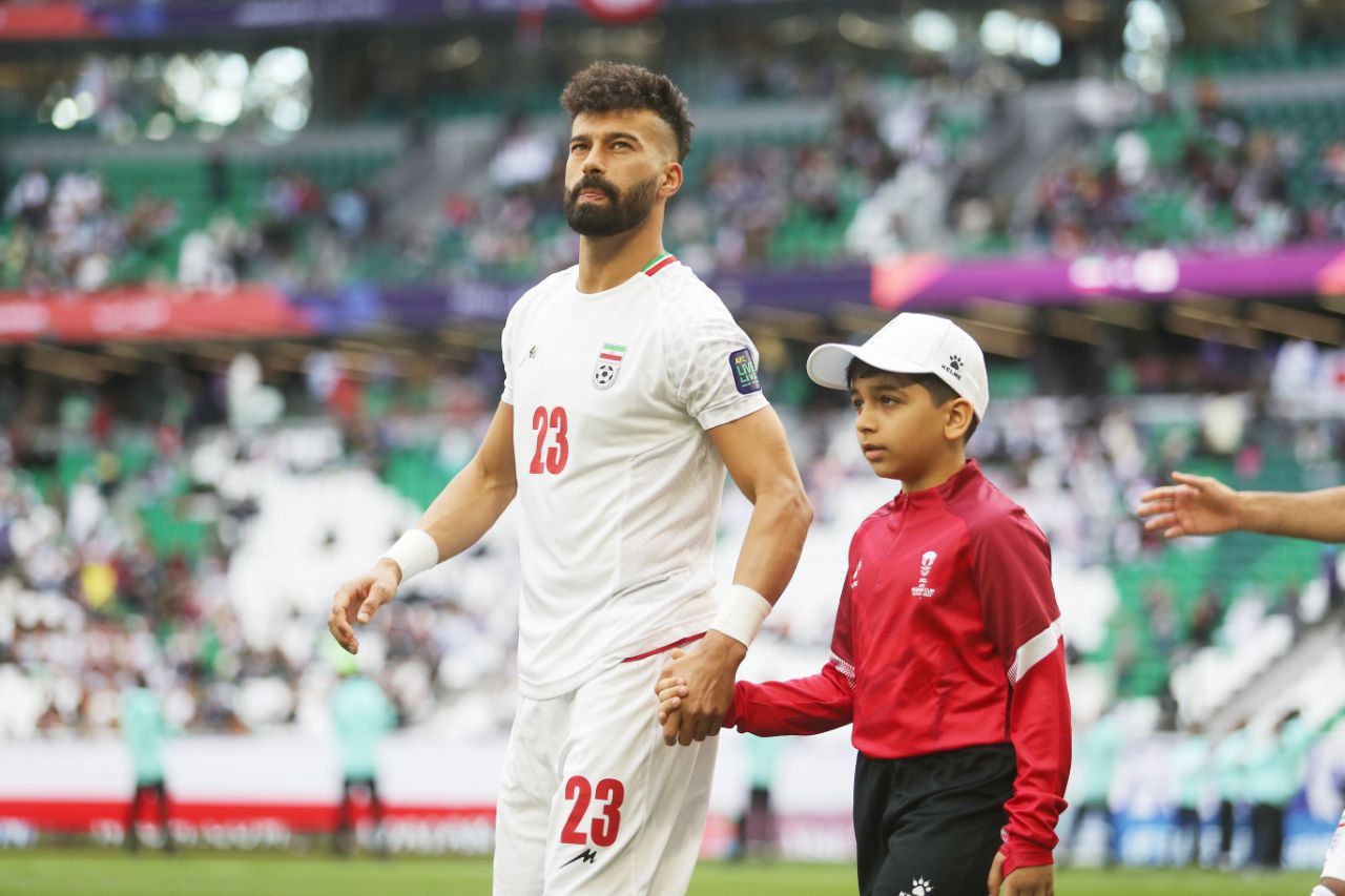 عکس از رامین رضاییان مدافع راست تیم ملی ایران