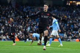 شادی گل پاتریک شیک پس از گلزنی برای بایرلورکوزن مقابل منچسترسیتی