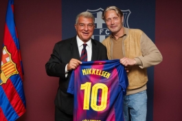 مدس میکلسن و خوان لاپورتا در حاشیه بازی بارسلونا و ختافه