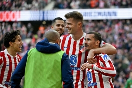 بازیکنان اتلتیکو مادرید پس از گلزنی مقابل والنسیا در لالیگا