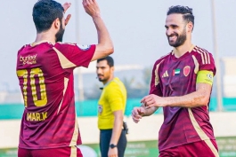 عکس از احمد نوراللهی و عمر خریبین بازیکنان الوحده امارات
