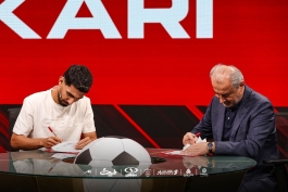 عکس از رضا شکاری و رضا درویش امضای قرارداد
