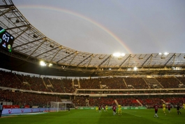 A rainbow is seen above the AWD Arena as Hannover 96 slug it out against Borussia Dortmund