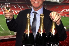 Sir Alex Ferguson the manager of Manchester United at Old Trafford celebrates winning the Premier League Title for the third time in a row, in the 2000-01 season