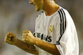 Real Madrid's David Beckham reacts when he scores his first goal after joining during the first half pre-season match agaisnst FC Tokyo at the National Stadium in Tokyo 05 August 2003