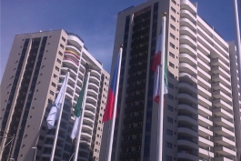پرچم ایران در دهکده المپیک برافراشته شد (عکس)