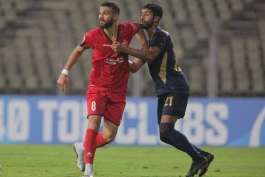 احمد نوراللهی هافبک سابق پرسپولیس تهران در بازی مقابل الوحده امارات - لیگ امارات - لیگ نخبگان آسیا