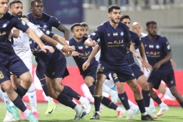 محمدمهدی زارع مدافع میانی گل گهر و تیم ملی ایران - آرمین سهرابیان مدافع وسط استقلال تهران - بازی استقلال و گل گهر - لیگ برتر ایران