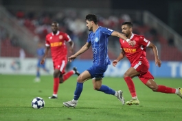 عکس از سعید سحرخیزان مهاجم استقلال در بازی مقابل المحرق