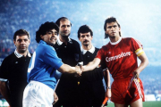 Napoli’s Maradona and Bayern München’s Klaus Augenthaler before their UEFA Cup match in 1989