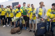 Sweden players carry their kit from the plane