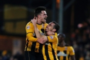 Cambridge’s Ryan Donaldson and Tom Champion celebrate after holding Manchester United to a 0-0 draw at the Abbey Stadium and a lucrative replay at Old Trafford.